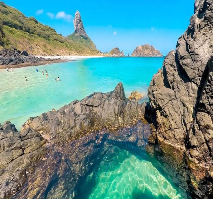 Discover Noronha: 7-Hour Ilhatour Adventure - Timing, pickup, and the day’s pace