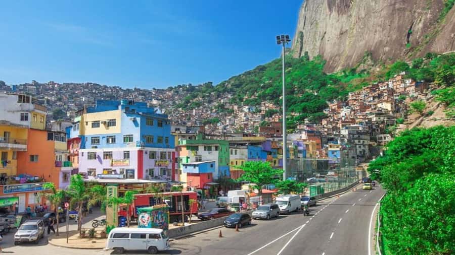 Rio: Favela Walking Tour of Rocinha with a Resident Guide - Craft stalls, street markets, murals, and capoeira