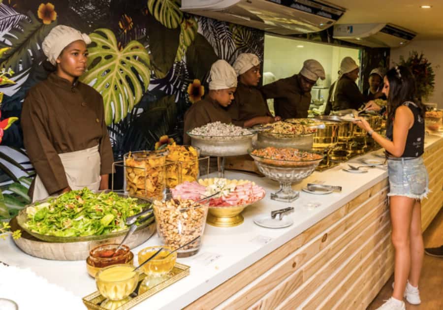 Rio: Premium Carnival Seating with Food, Drinks, & Transfers - Your evening begins with hotel pickup